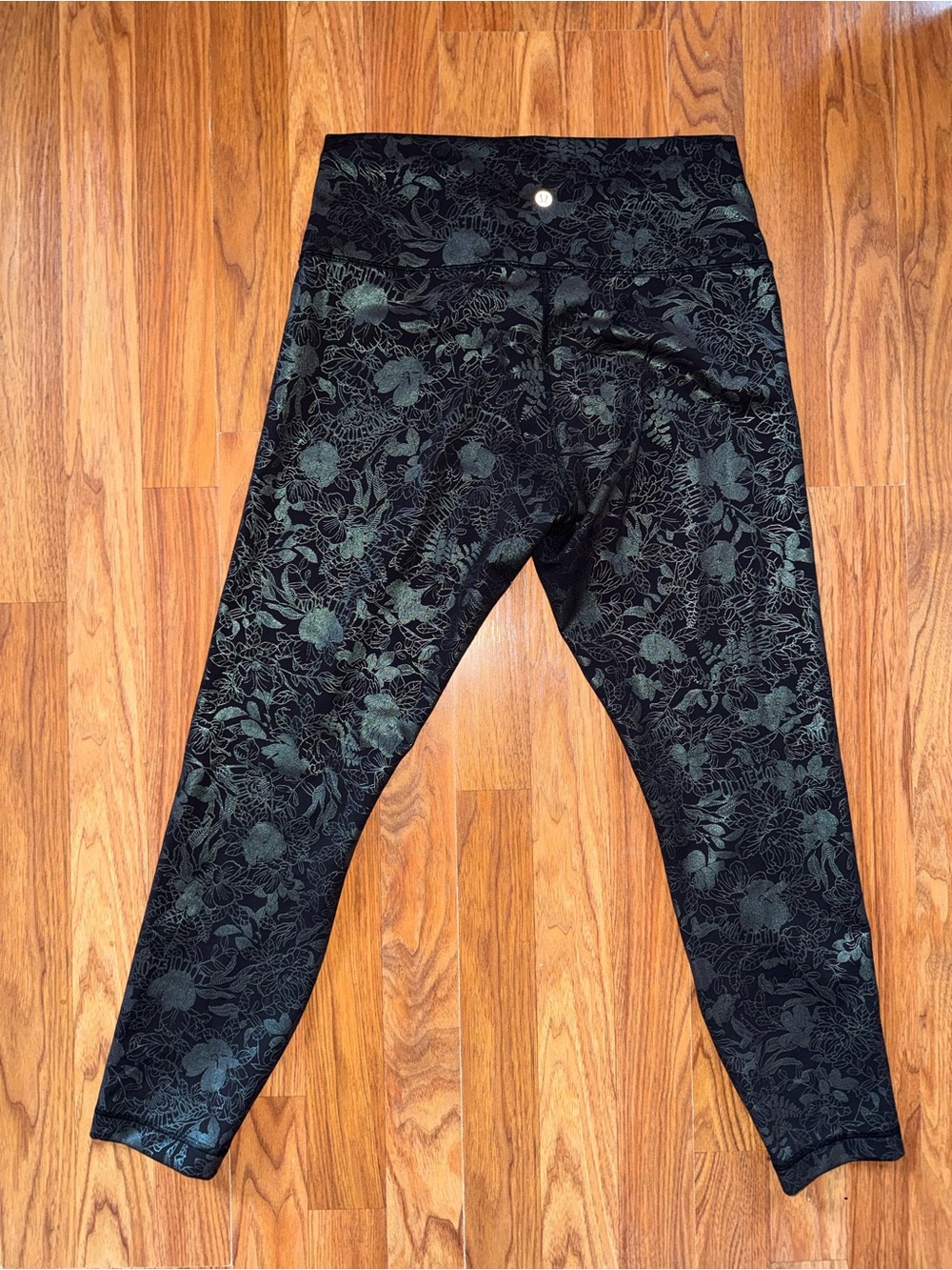 Lululemon Wunder Train High-Rise Tight 25" in the "Logo Flourish Black”